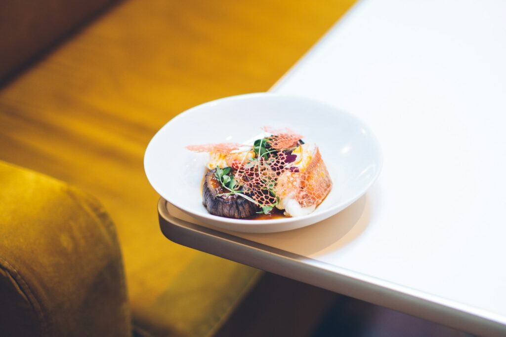 a plate of food sitting on top of a table
